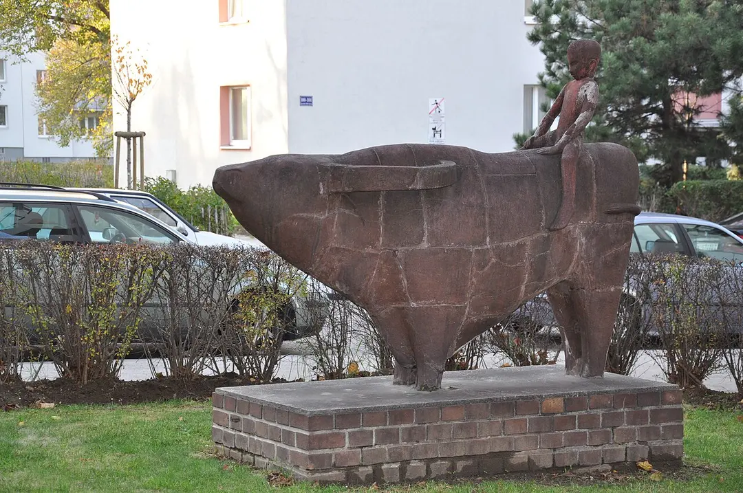 Wasserbüffel und Knabe